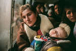 December 26th 1999.
 A Chechen woman and her child in a bus headed for Dagestan.
